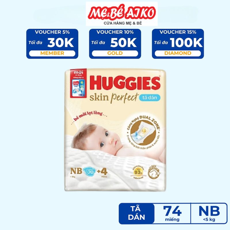 Tã/bỉm dán sơ sinh Huggies Skin Perfect NB 70+4 miếng với 2 vùng thấm giảm kích ứng da